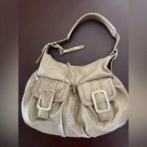 Beautiful gold Cole Haan hobo bag.